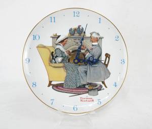 lot 62 image: Hoyle Products Gaily Sharing Vintage Times Norman Rockwell Plate Clock