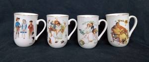 lot 101 image: Set of 4 Vintage Norman Rockwell Porcelain Mugs.