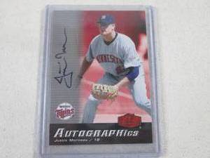 lot 51 image: 2006 Fleer Showcase Justin Morneau ...