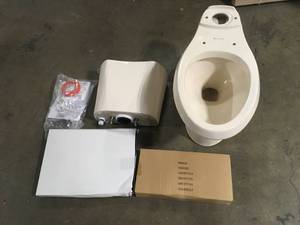 2-piece 1.28 GPF High Efficiency Single Flush Elongated Toilet in Bone by Glacier Bay Customer Returns See Pictures