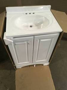 24.5 in. W x 18.63 in. D x 35.38 in. H Bath Vanity in White with Cultured Marble Vanity Top in White with White Basin by Glacier Bay Customer Returns See Pictures