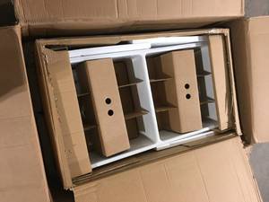 lot 17 image: Classico Farmhouse Apron Front Fireclay 33 in. Double Bowl Kitchen Sink with Bottom Grid and Strainer in White by BOCCH Customer Returns See Pictures