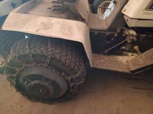 lot 22 image: Bolens H16 XL Lawn Tractor, No Mower Deck, Has Chains and Weights, Model No. OH160170089A, Serial No. 7314E