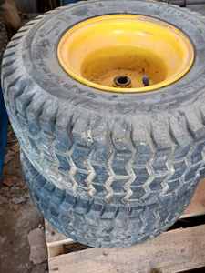 lot 101 image: One 18.58.5-8 Rear Tire and Rim, and a Set of 4 Yellow Rims with 18 X 8.50 - 8 Rear Tires and 15 X 6.00 - 6 Front Tires and Rims