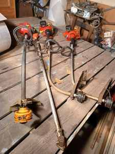 lot 120 image: Four Gas Powered Lawn Trimmers