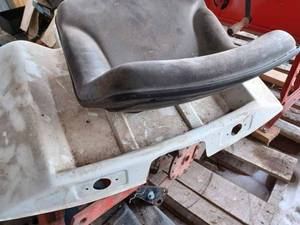 lot 142 image: New Rear Fenders and a Used Seat for Bolens Lawn Tractor