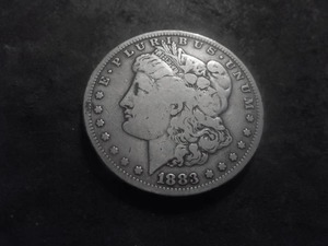 lot 22 image: 1883 S Morgan Silver Dollar