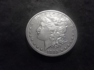 lot 29 image: 1885 S Morgan Silver Dollar