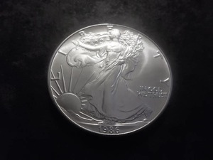lot 48 image: 1986 American Eagle Dollar 1 Oz. 99.9 Fine Silver MS From Unc. Roll.