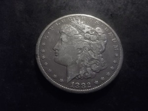 lot 16 image: 1882 CC Morgan Silver Dollar