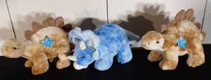 lot 89 image: FAO Schwarz 12 Glow Brights LED with Sound Dinosaur Toy Plushes (2) Stegosaurus & (1) Triceratops