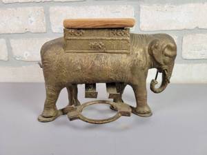 lot 27 image: Antique Cast Iron Elephant Cigarette Roller