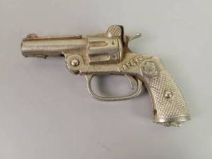 lot 42 image: Antique Cast Iron Toy Cap Gun SAFETY Patent March 26, 1924