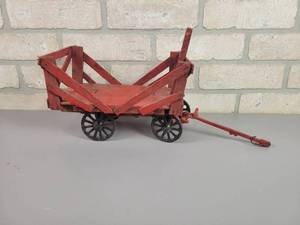 lot 48 image: Cast Iron Running Gear w Wood Hay Rack