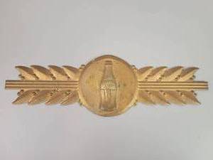 lot 50 image: Antique Coca-Cola Embossed Metal Badge