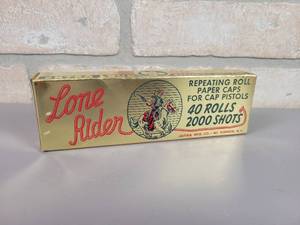 lot 14 image: Vintage Lone Rider Repeating Roll Paper Caps - Box is Full