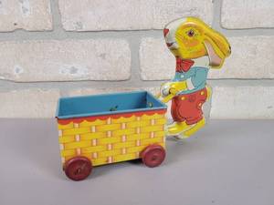 lot 67 image: Vintage Tin Litho J. Chein Bunny Pushing Egg Cart