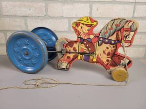 lot 70 image: 1040s Gong Bell Co. Horse & Rider Pull Toy - Works