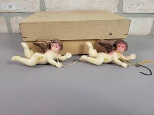 lot 72 image: (2) Vintage Plastic Blow Mold Cherub Christmas Ornaments