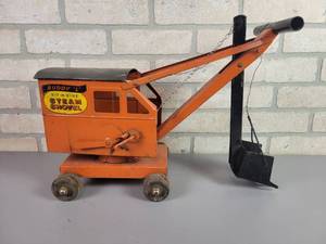 lot 11 image: 1950s BuddyL Pressed Steel SIT-N-RIDE Steam Shovel Toy