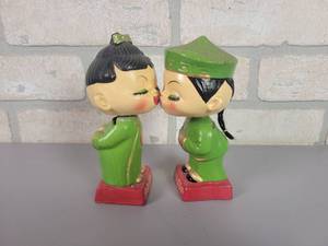 lot 108 image: 1950s Lets Kiss Bobbleheads
