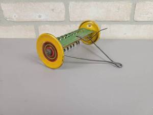 lot 127 image: Vintage Tin Litho Hay Rake Toy