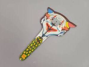 lot 151 image: Vintage Tin Litho CLOWN Childrens Noise Maker - U.S. Metal Toy Mfg. Co.
