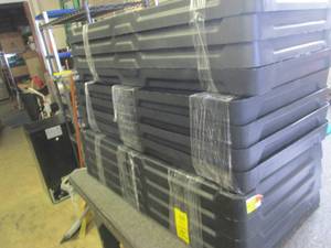 3 black plastic shelving units some...