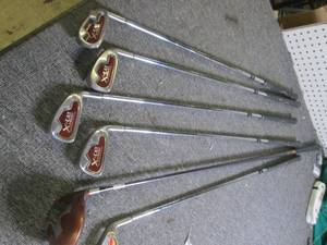 6 golf clubs ...