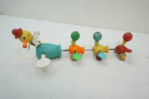 lot 60 image: Vintage Fisher Price pull toy