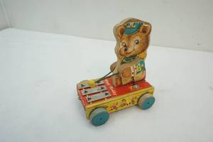 lot 61 image: vintage Fisher Price Tiny Teddy pull toy