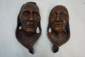 lot 98 image: Sculpted wall hangings