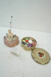 lot 240 image: Vintage pincushion , hat pins