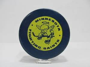 lot 64 image: Awesome Vintage Minnesota Fighting Saints Hockey Puck