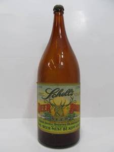 lot 10 image: Fantastic Early LARGE Schells Picnic Beer Bottle