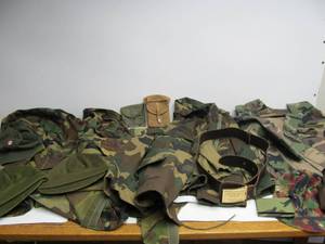 lot 144 image: Large Lot of Vintage & Newer Military Jackets Fatigues etc