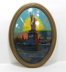 lot 208 image: Antique Goddess of Liberty Reverse Painted CovexBubble Glass Oval Framed Artwork