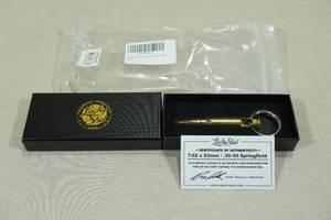 lot 64 image: Lucky Shot .30-06 Sprg Keychain Bottle Opener - Korean War Era