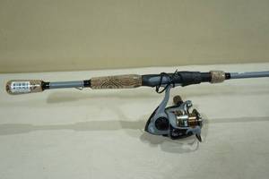 lot 127 image: Ozark Trail OTX Spinning Fishing Rod and Reel Combo