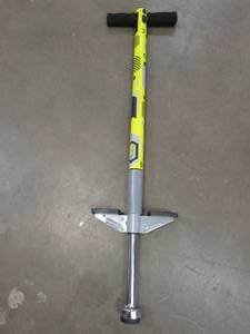 lot 76 image: Pogo Stick in Gray & Yellow