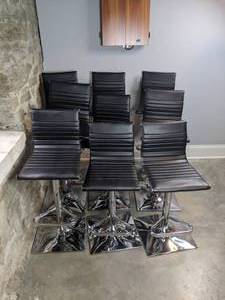 lot 82 image: Set of Nine Black Salon Chairs
