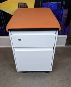 lot 35 image: 2-Drawer Mobile Pedestal File Cabinet with Orange Cushion