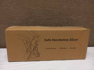 lot 10 image: NEW SAFE MANDOLINE SLICER