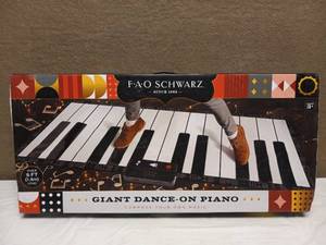 lot 16 image: NEW FAO SCHWARZ GIANT DANCE ON PIANO MAT