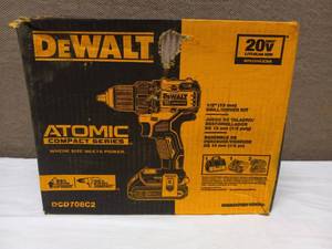 lot 64 image: NEW DEWALT ATOMIC COMPACT SERIES 12 DRILLDRIVER  KIT