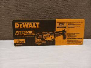 lot 70 image: NEW DEWALT ATOMIC COMPACT SERIES OSCILLATING MULTI TOOL