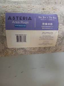 lot 83 image: NEW ASTERIA AREA RUG
