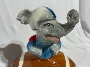 lot 84 image: Vintage Jim Beam 100-Month Burbon Decanter - Elephant & Football