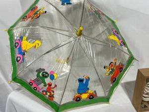 lot 142 image: Vintage Sesame Street, Toys, and More