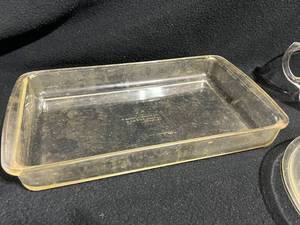 lot 55 image: Vintage Pyrex Baking Dishes and Measuring Cup